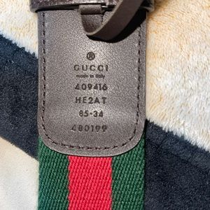 UCCI GOLD GG CANVAS WEBBING BELT W/ BLACK LEATHER